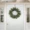 First Traditions™ 24'' Pre-Lit Artificial North Conway Wreath with Glittery Cones and Eucalyptus